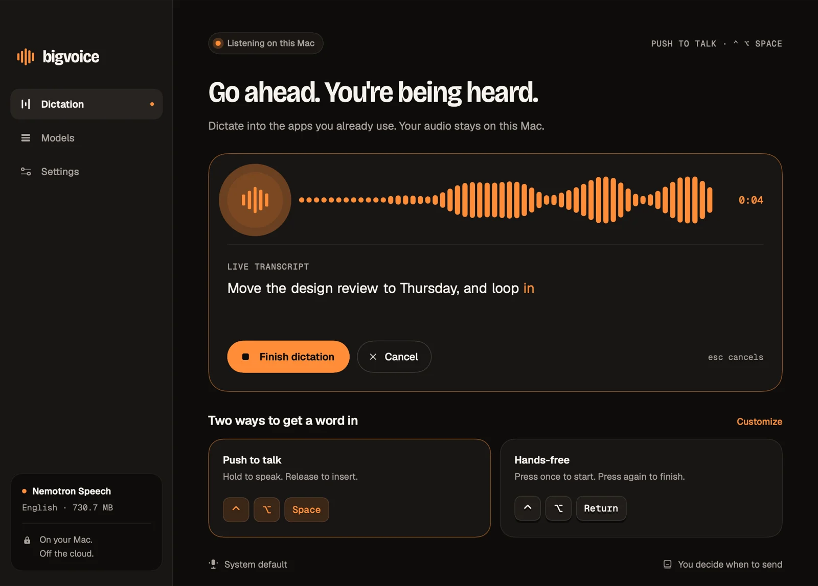 The bigvoice window while listening: a live orange waveform, a 0:04 timer, and the live transcript with the newest word in orange.